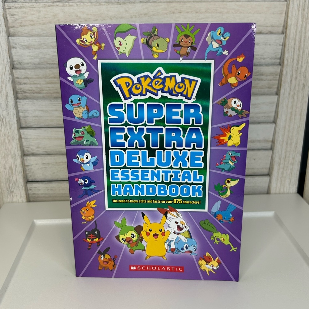 Pokémon Super Extra Deluxe Essential Handbook Paperback Book
